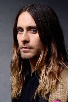 How can a man grow long hair?