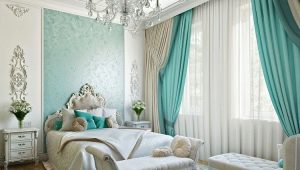 Turquoise curtains in the bedroom interior