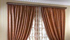 Brown curtains in the bedroom interior