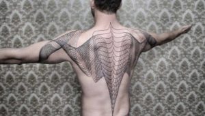 Tout sur les tatouages ​​​​dans le dos des hommes