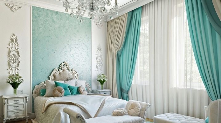 Turquoise curtains in the bedroom interior