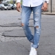 Jeans strappati da uomo: cosa sono e cosa indossare?