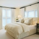 White curtains in the interior of the bedroom