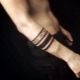 Description des tatouages ​​​​pour hommes sous forme de bracelet et leur emplacement