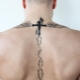 Tout sur les tatouages ​​​​de la colonne vertébrale des hommes